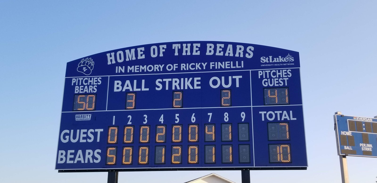 Mounted scoreboard on athletic field