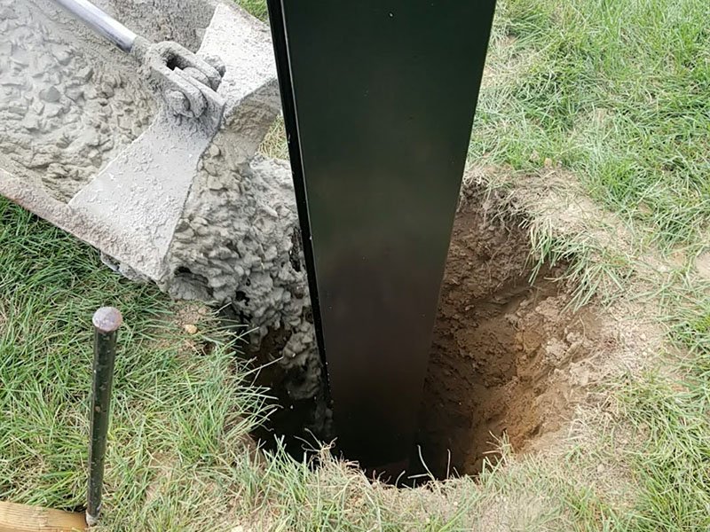 Crew preparing foundation for new scoreboard structure