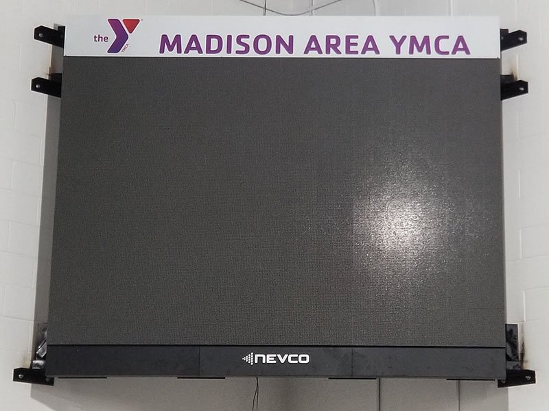 Crew installing videoboard panels